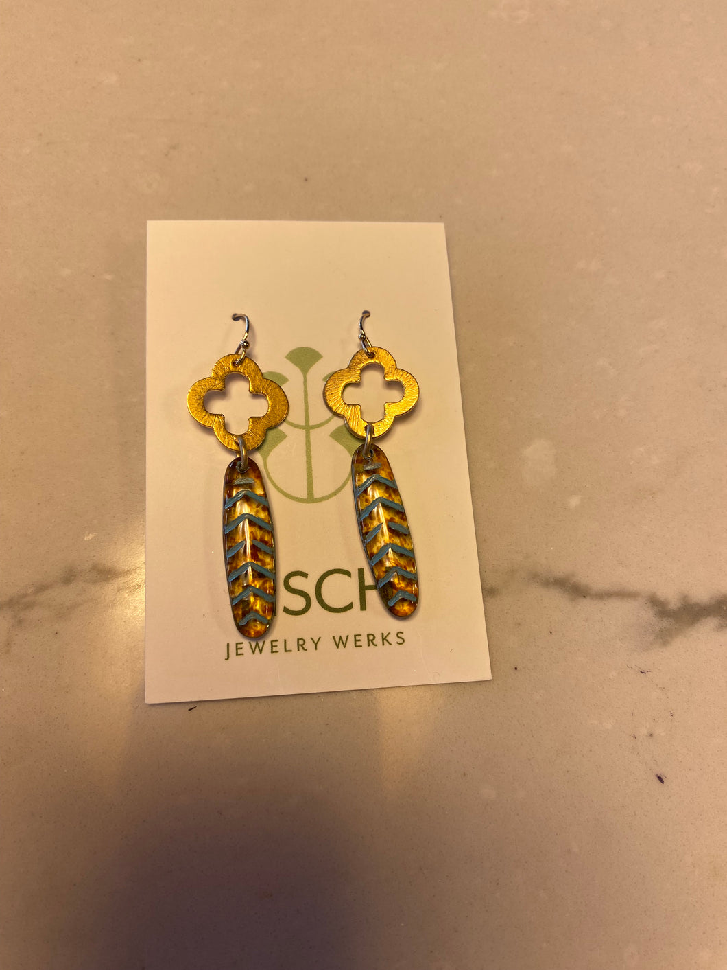 Gold Dangle Earrings w/ jagged teal design