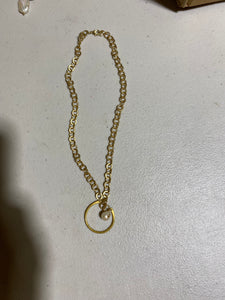Gold Chain Necklace w/ pearl and circular emblem
